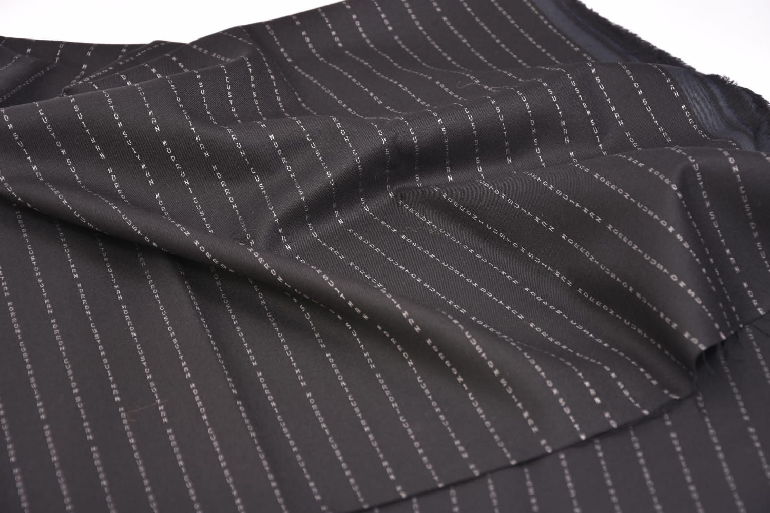 Personalized name woven suit fabric by House of Bansilal